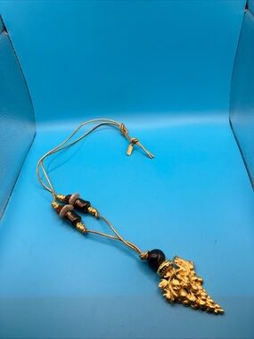 Gold-Tone Leaf Cluster Necklace with Brown Bead Accents